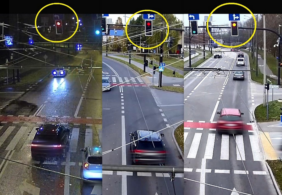 Pojazdy przejeżdżające przez skrzyżowanie na czerwonym świetle.