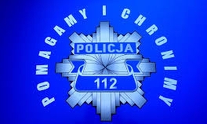 gwiazda policyjna a wokół niej napis pomagamy i chronimy